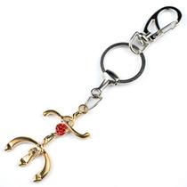 Chaveiro Pomba Gira Tridente Dourado Rosa 15 cm Metal