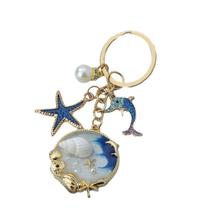Chaveiro Starfish Dolphin Seashell Alloy com tema oceânico Chaveiro Starfish Dolphin Seashell Alloy com tema oceânico