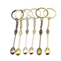 Chaveiro vintage de metal com design de coroa para homens e mulheres