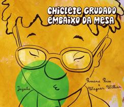 Chiclete grudado embaixo da mesa