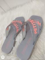 Chinelo petite Jolie transparente com neon Chinelo petite Jolie transparente com neon