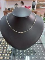 Choker em preta com pedras em colorido. Choker em preta com pedras em colorido.