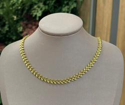 Choker folha seta banhado a ouro 18 com 10 milésimos .