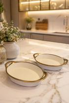 Cj de travessas oval em ceramica com alca branca com detalhe dourado 2pcs Cj de travessas oval em ceramica com alca branca com detalhe dourado 2pcs