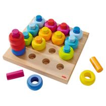 Classificando e empilhando anéis Shape Sorter HABA Rainbow Whirls Classificando e empilhando anéis Shape Sorter HABA Rainbow Whirls
