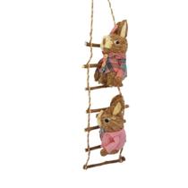 Coelhos páscoa em palha na escada