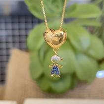 Colar Coração com Criança Cravejada Ref. 35.0882 Menino Dourado Colar Coração com Criança Cravejada Ref. 35.0882 Menino Dourado