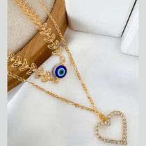 Colar Duplo Escamas texturizadas com Coração Cravejado e Olho Grego Folheado a Ouro Colar Duplo Escamas texturizadas com Coração Cravejado e Olho Grego Folheado a Ouro