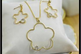 Colar e brinco estrela radiante em bijoteria