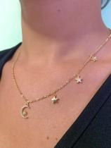 Colar lua cravejada com zircônias e estrelas banhado a ouro18k