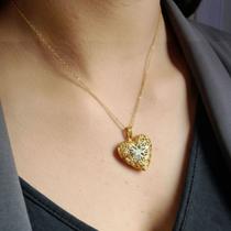 Colar relicário com foto de coração de aço com banho ouro