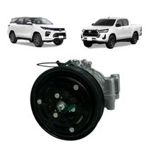 COMPRESSOR ORIGINAL DENSO 10SRE11C TOYOTA HILUX / SW4 2.8 DIESEL 20152022 POLIA 7PK 12V Única