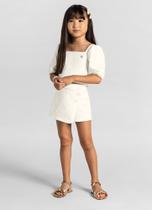 Conj. blusa e shorts saia poá/tam: 12