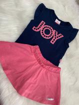 Conjunto blusa e saia/shorts BM Conjunto blusa e saia/shorts BM