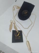 conjunto brincos e corrente penas dourada conjunto brincos e corrente penas dourada