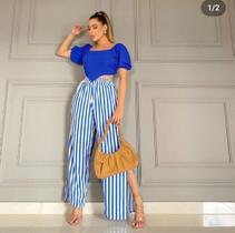 Conjunto calça azul com listas e blusa com manga azul Conjunto calça azul com listas e blusa com manga azul