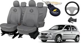 Conjunto capa couro cinza Corsa 95-10 + chaveiro Conjunto capa couro cinza Corsa 95-10 + chaveiro