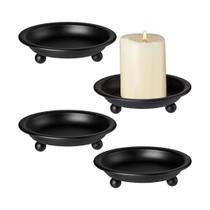 Conjunto de 2 castiçais vintage de ferro preto com mão elegante