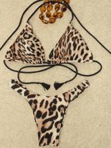 Conjunto de Biquini estampa Leopardo com Calcinha Asa Delta Levanta Bumbum e Top Cortininha com ponteiras Conjunto de Biquini estampa Leopardo com Calcinha Asa Delta Levanta Bumbum e Top Cortininha com ponteiras
