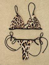 Conjunto de Biquini estampa Leopardo Top Triangulo transpassado com varias amarrações e tanga Fio Dental marquinha Conjunto de Biquini estampa Leopardo Top Triangulo transpassado com varias amarrações e tanga Fio Dental marquinha