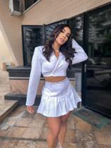 Conjunto de blusa e saia Conjunto de blusa e saia