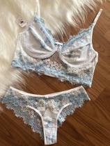 Conjunto de lingerie cor branca de renda Conjunto de lingerie cor branca de renda