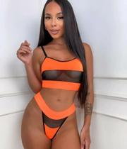 Conjunto de malha e tule laranja neon tamanho G