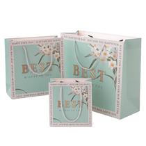 Conjunto de sacolas de presente com design floral azul em três tamanhos Conjunto de sacolas de presente com design floral azul em três tamanhos