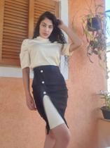 Conjunto detalhes na saia com tecido na blusa no camelado