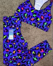 Conjunto fitnnes na cor azul com estampa de onça com diversas cores TAM P Conjunto fitnnes na cor azul com estampa de onça com diversas cores TAM P