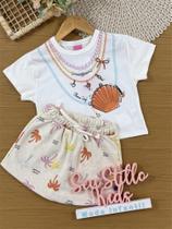 Conjunto Infantil Belime Verão com Shorts Saia Off White e Blusa Branca Acessórios 3D Conjunto Infantil Belime Verão com Shorts Saia Off White e Blusa Branca Acessórios 3D
