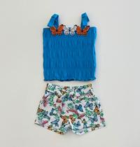 Conjunto Infantil Cropped Azul com Laços e Shorts Estampado Colorido Premium