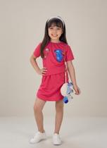 Conjunto Infantil Menina Blusa e Saia Shorts Liso Rosa Com Estampa Stitch - Ikaros Kids Conjunto Infantil Menina Blusa e Saia Shorts Liso Rosa Com Estampa Stitch - Ikaros Kids