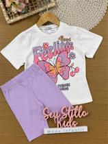 Conjunto Infantil Momi Verão com Shorts Ciclista Lilás e Blusa Branca Borboleta