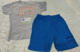 Conjunto infantil tamanho 8 short azul e camisa cinza. Conjunto infantil tamanho 8 short azul e camisa cinza.