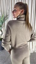 Conjunto Modal Blusa com Gola Alta e Calça Pantalona Conjunto Modal Blusa com Gola Alta e Calça Pantalona