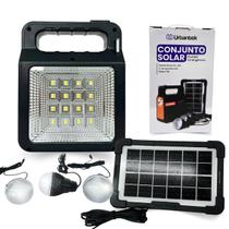 Conjunto Solar Portátil de Emergência Com Painel Solar 6V 4W, 3 Lâmpadas LED e Rádio FM/ Bluetooth Urbantek Conjunto Solar Portátil de Emergência Com Painel Solar 6V 4W, 3 Lâmpadas LED e Rádio FM/ Bluetooth Urbantek