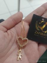 corrente dourada com pingente de coraçao e de menino filho unico banhada a ouro