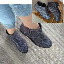 Coturno animal print em couro Coturno animal print em couro