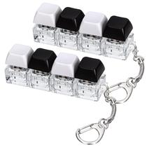 DEARIDAP Kit com 2 Brinquedos Fidget de Teclado 4 em 1 com Chaveiro DEARIDAP Kit com 2 Brinquedos Fidget de Teclado 4 em 1 com Chaveiro