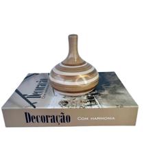 Decoração sala livro fake + vaso garrafa Aladim listrado