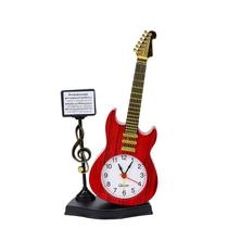 Despertador: design criativo de notas musicais para guitarra e violino Despertador: design criativo de notas musicais para guitarra e violino