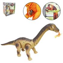 dinossauro bota ovo com projetor de imagem + som a pilha 50x25x13cm na caixa - MOHNISH
