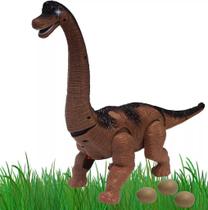 Dinossauro Braquiossauro Infantil Menino Eletrônico Som Luz Anda +3 Anos Movimentos Coloca Ovos Plástico Resistente Zoop