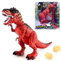 Dinossauro de Brinquedo que Anda Faz Sons e Bota Ovo Verde