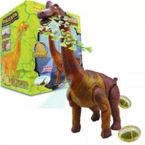 Dinossauro Eletrônico Bota Ovos Brinquedo Anda Emite Luz Som