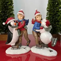 Dupla de Patinadores c/ Pinguim e Boneco de Neve - 17cm