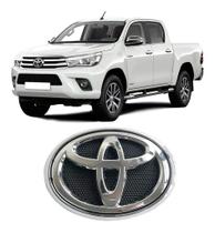 Emblema Grade Radiador Hilux 2016 2017 2018 Com Aro Cromado Emblema Grade Radiador Hilux 2016 2017 2018 Com Aro Cromado