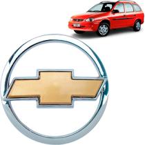 Emblema Gravata Corsa Wagon 1996 1997 1998 A 2002 Dourada