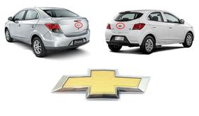 Emblema Gravata Dourado Porta Mala Onix Prisma 2013 a 2016